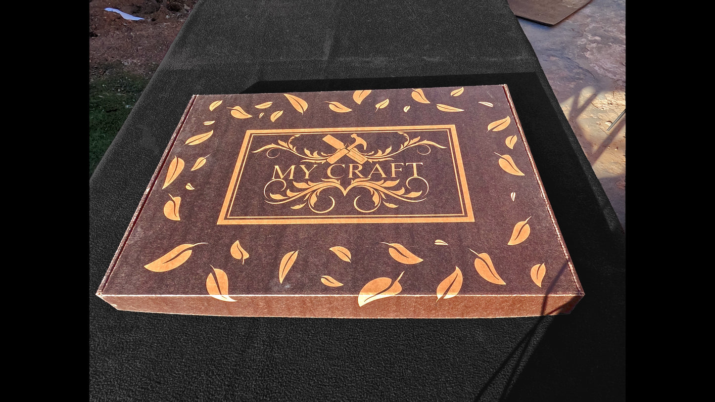 Front top view of the custom-made brown packaging with the My craft logo on top, surrounded by falling leaves made for gift ready aesthetics.