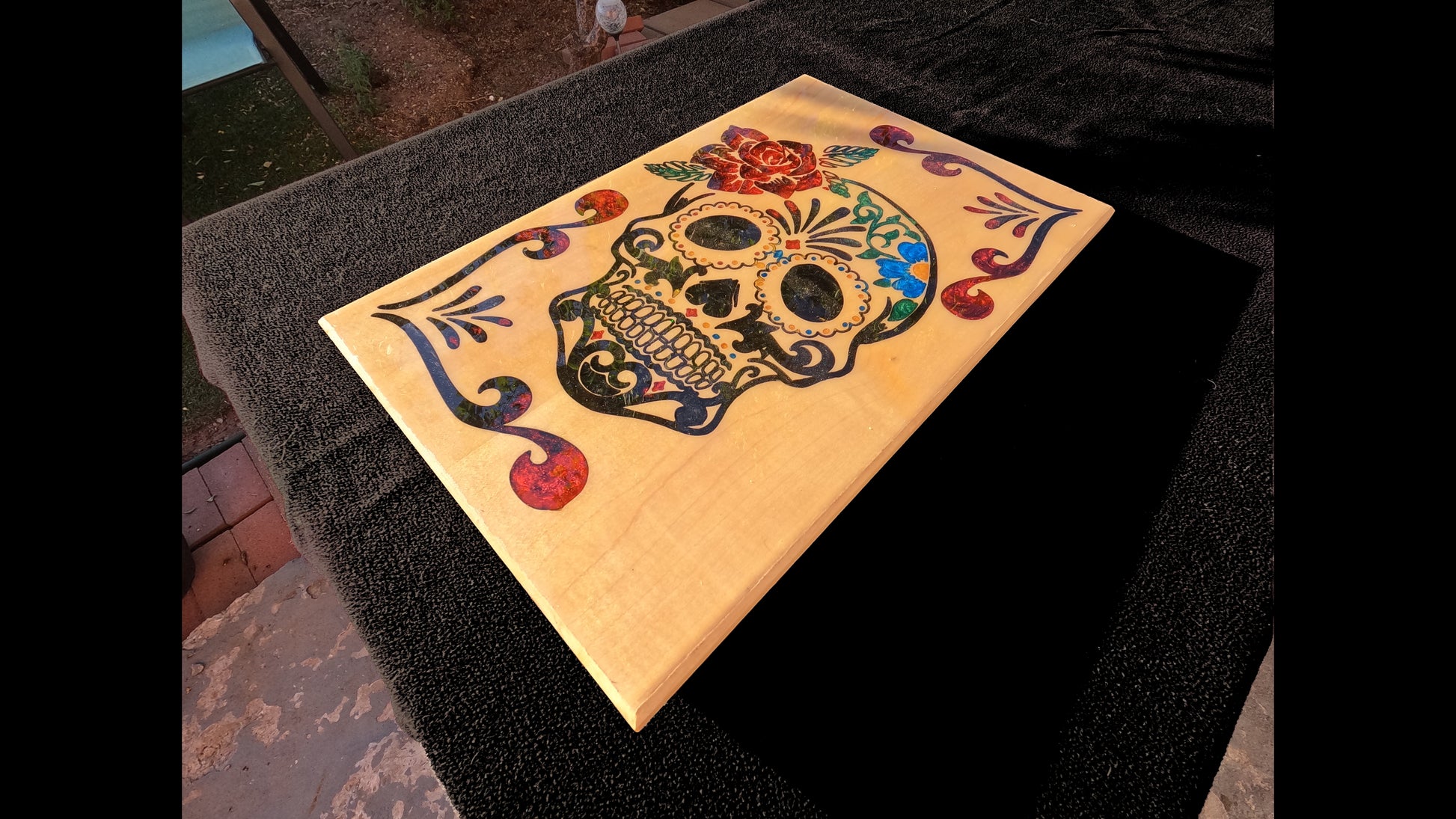 lower corner view of the Dia de Los Muertos skull design.